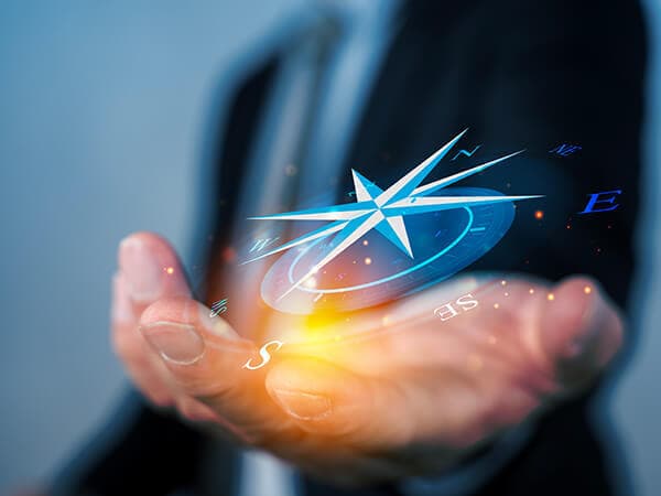 Man with abstract star and universe hovering above hand