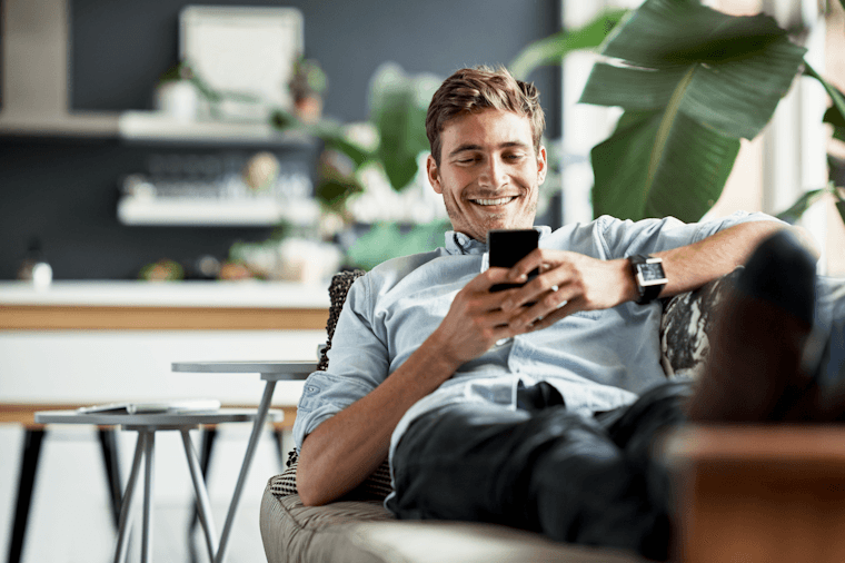 Blog man reclining cell phone