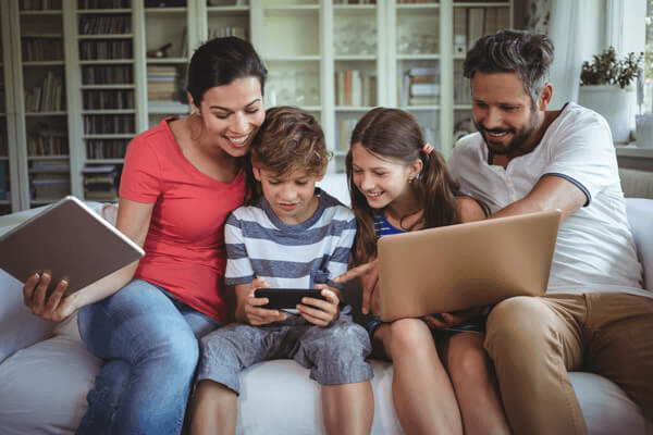 Blog family with tablet cell phone laptop Blog family with tablet cell phone laptop