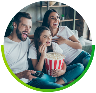 happy family eating popcorn while enjoying streaming tv